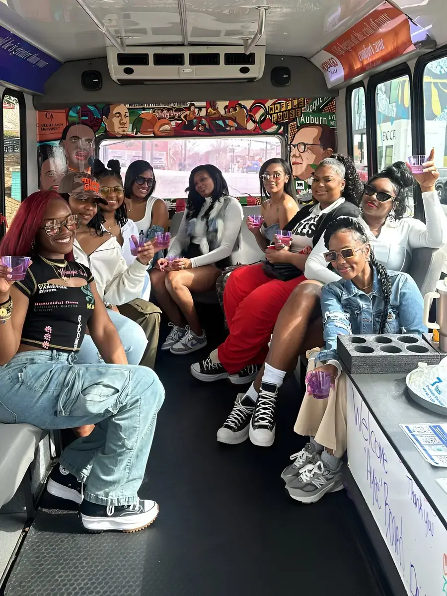 Group celebrating on the bus