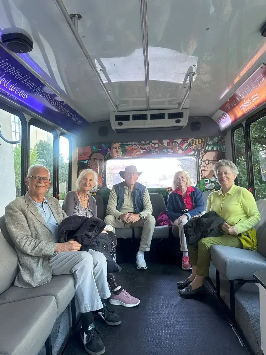 Guests seated inside the bus