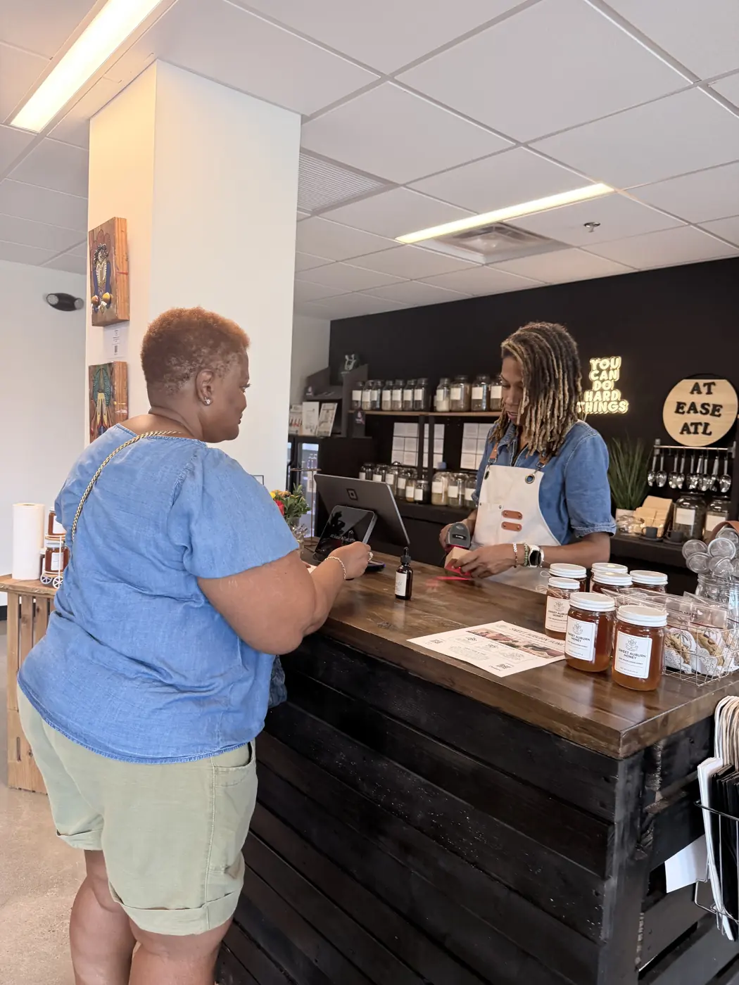 Tour guests shopping at a local partner business